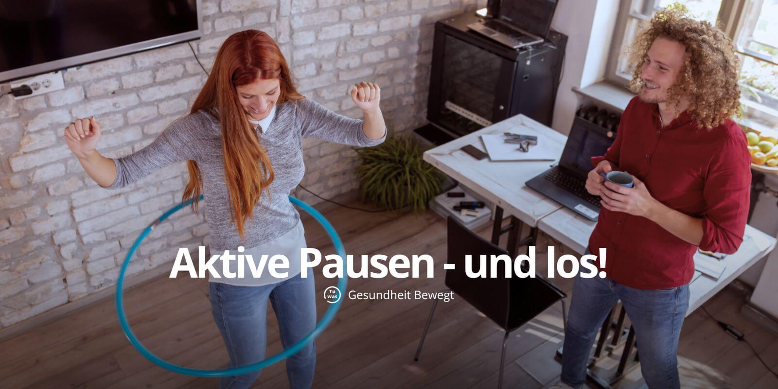 Frau-mann-mit hulahoop-Reifen.machen-aktive-pause-im-buero